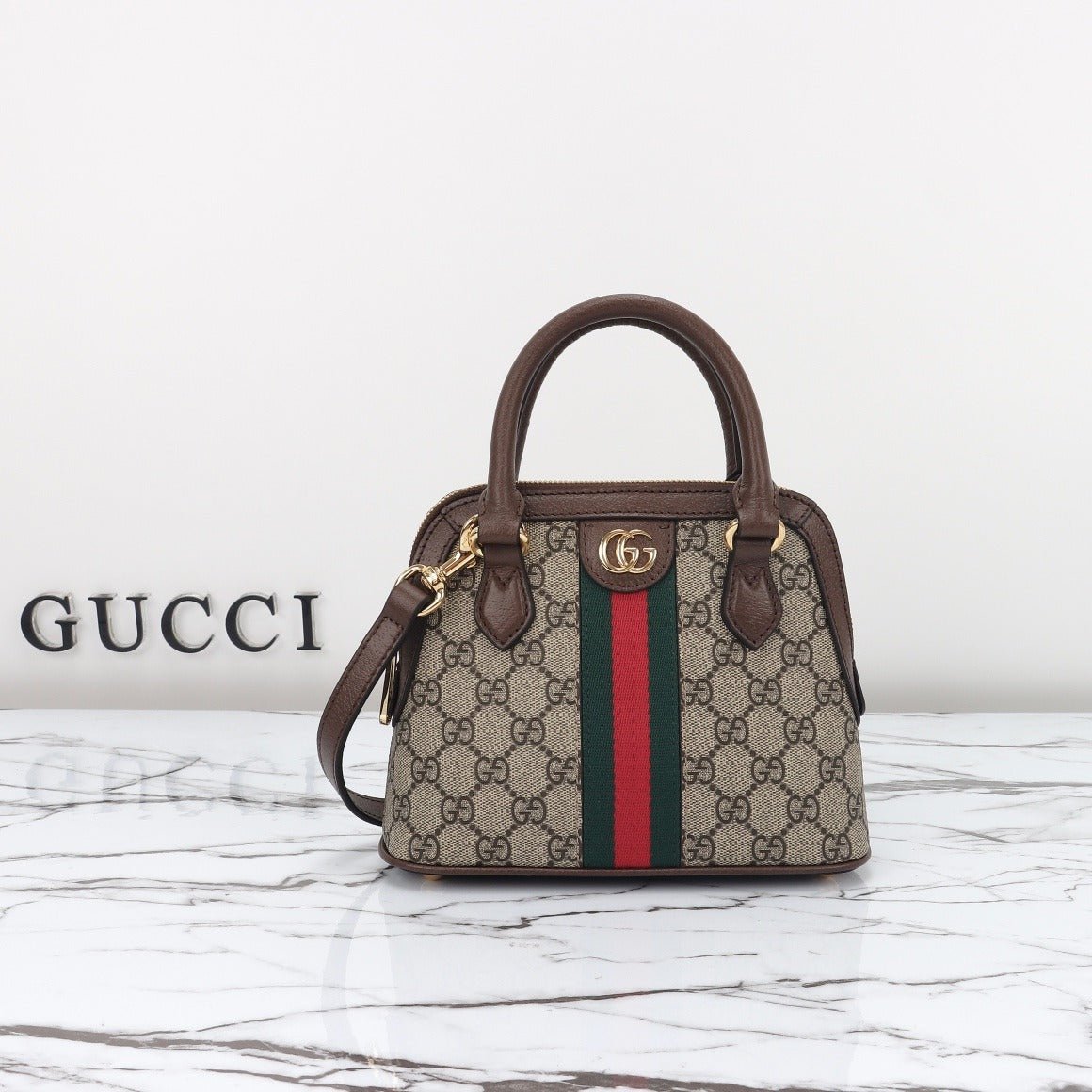 Gucci  Sac à main Gucci Ophidia en toile sûpreme GG beige et cuir marron