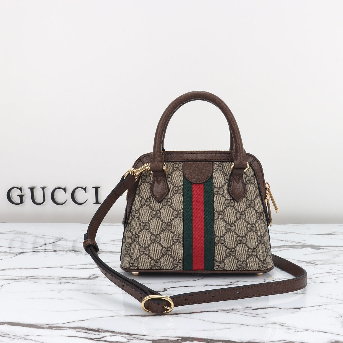 Gucci  Sac à main Gucci Ophidia en toile sûpreme GG beige et cuir marron